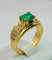 Bague 59 Bague en or jaune avec une émeraude centrale et des diamants. 58 Facettes 50251