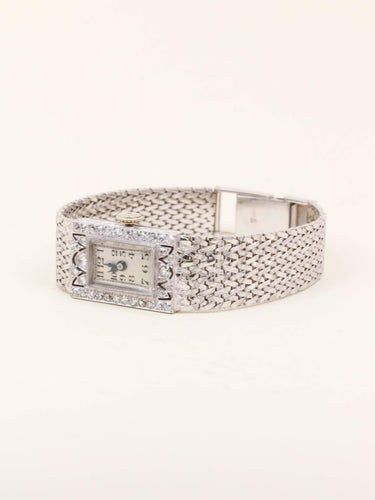 Montre Montre Art Déco or blanc diamants 58 Facettes 1181.7
