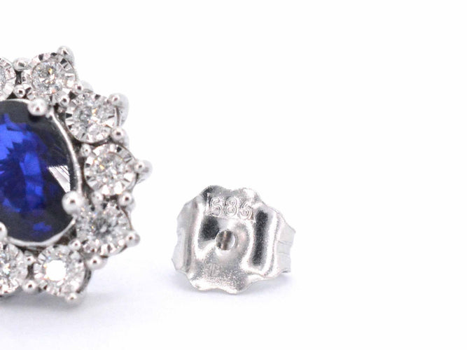 Boucles d'oreilles Boucles d'oreilles en or blanc avec diamants et saphir 58 Facettes 2297