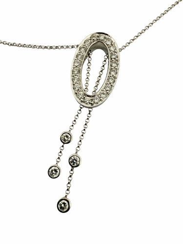 Parure collana e orecchini in oro bianco e diamanti 