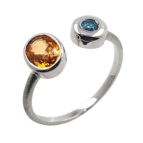 Bague 54 Bague en or blanc avec grenat spessartite et diamant bleu 58 Facettes 19062291