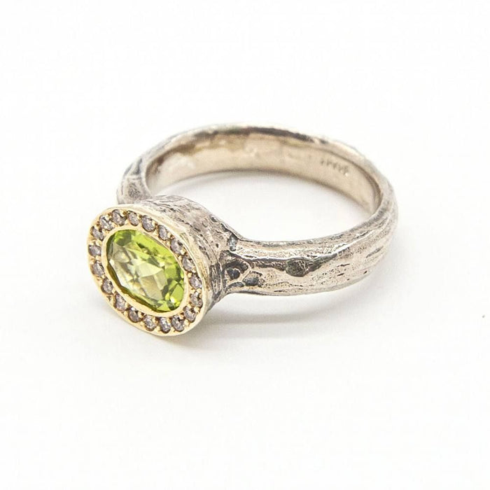 Silber- und Goldring mit Diamanten und Peridot