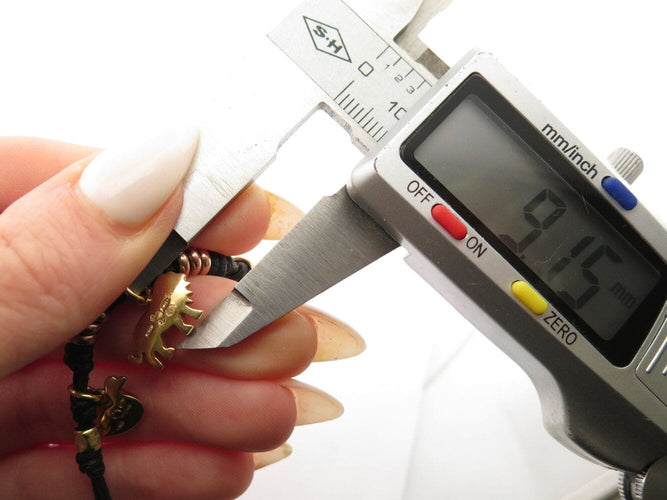 Bracelet bracelet dodo rondelles granelli charms lion pingouin canard or jaune 18k 58 Facettes 271162