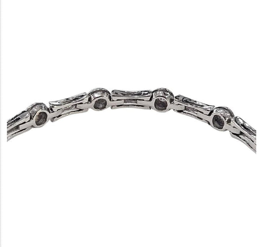 Bracelet Bracelet design contemporain en or avec diamants 58 Facettes Q263B(99)