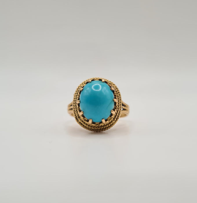 Bague 60 Bague or jaune sertie d’une turquoise 58 Facettes