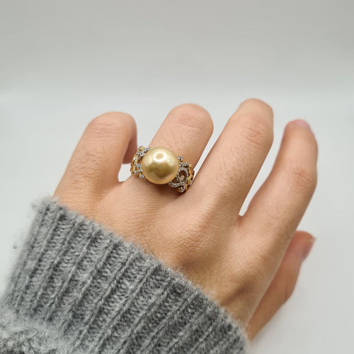 Bague 54 Bague or jaune 18 carats sertie d’une perle de culture et diamants 58 Facettes