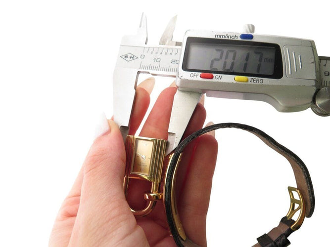 Montre montre vintage HERMES Kelly Mini Cadenas 20 mm plaque or quartz dame 58 Facettes 268902