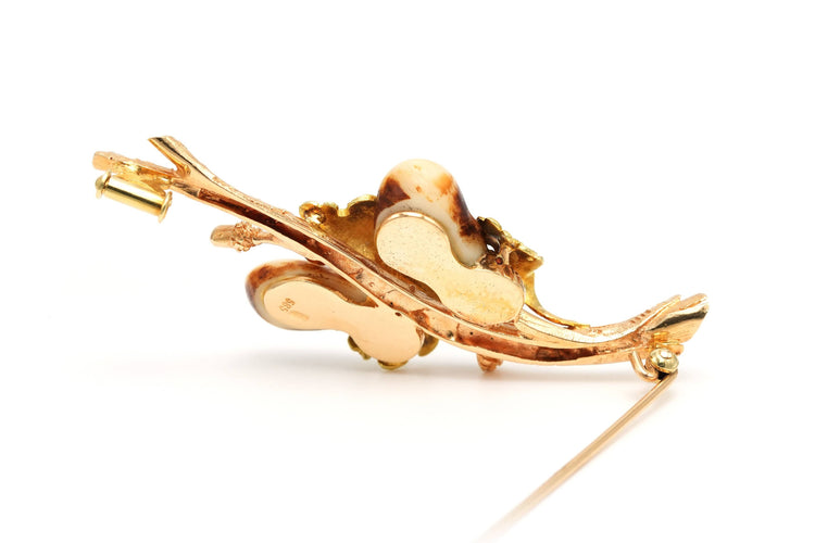 Broche Broche contemporaine en or jaune sertie de dents de chevreuil 58 Facettes 22918