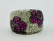 Bague Bague en or ornée de motifs floraux composés de diamants et de rubis 58 Facettes 50166