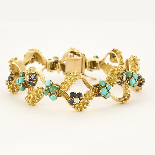 Bracelet Bracelet en or jaune, turquoises, saphirs et diamants 58 Facettes BIA1187