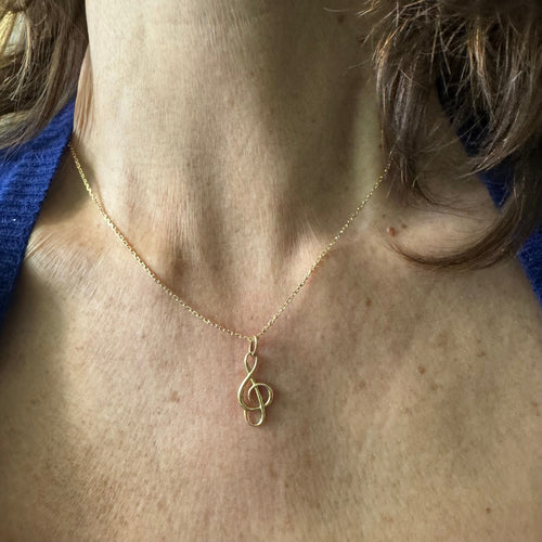 Collier Collier "clé de sol" Or jaune 58 Facettes 26895