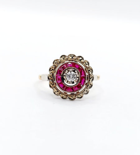 Bague 48 Bague cible Art Déco or rose, diamant, rubis calibrés (circa 1920) 58 Facettes A04432