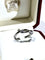 Bague 56 Cartier - Bague Entrelacés en or blanc 58 Facettes