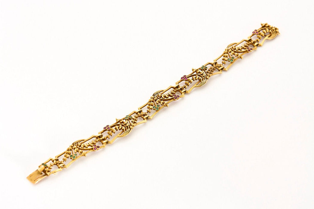 Bracelet BOUCHERON - Bracelet Art Nouveau rubis, émeraudes, or jaune 58 Facettes