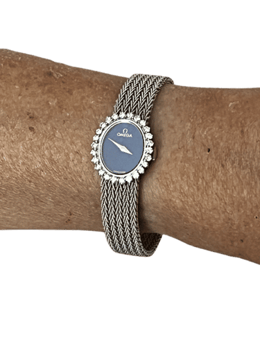 Montre OMEGA - Montre Dame or gris, diamants, lapis 58 Facettes REF. 6580