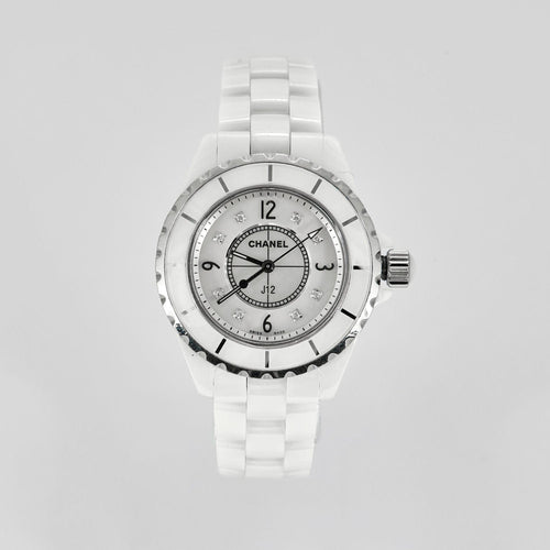 Montres CHANEL- J12 - Montre en céramique blanche. 58 Facettes 250278