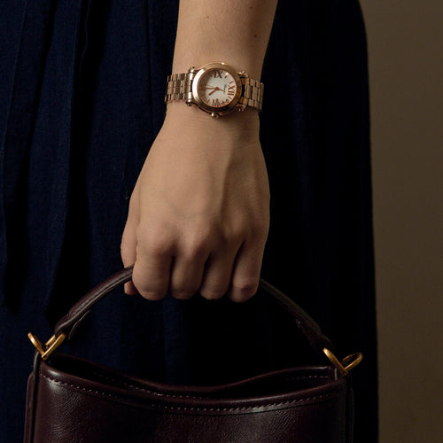 Montre Chopard-  Happy Sport - Montre en or rose et diamants 58 Facettes DRE1840