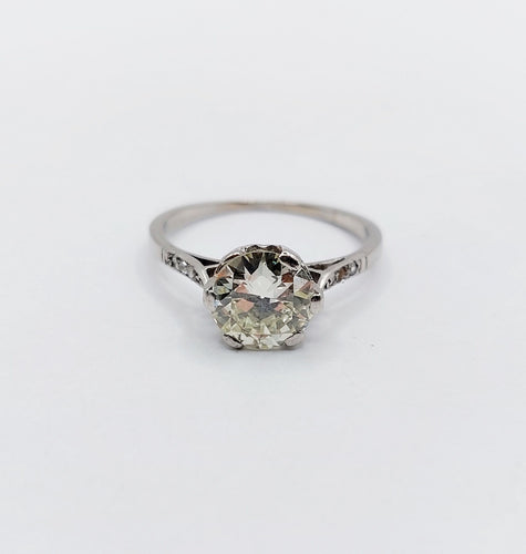 Bague 48 Bague solitaire art déco, platine et diamants 58 Facettes A05538