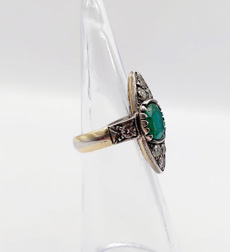 Bague 44 Bague marquise antique or jaune et platine, émeraude et diamants (circa 1920) 58 Facettes A06384