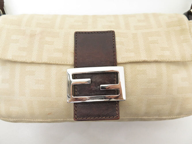 sac a main FENDI baguette en toile jacquard ff zucca beige 26424 hand bag 58 Facettes 270643