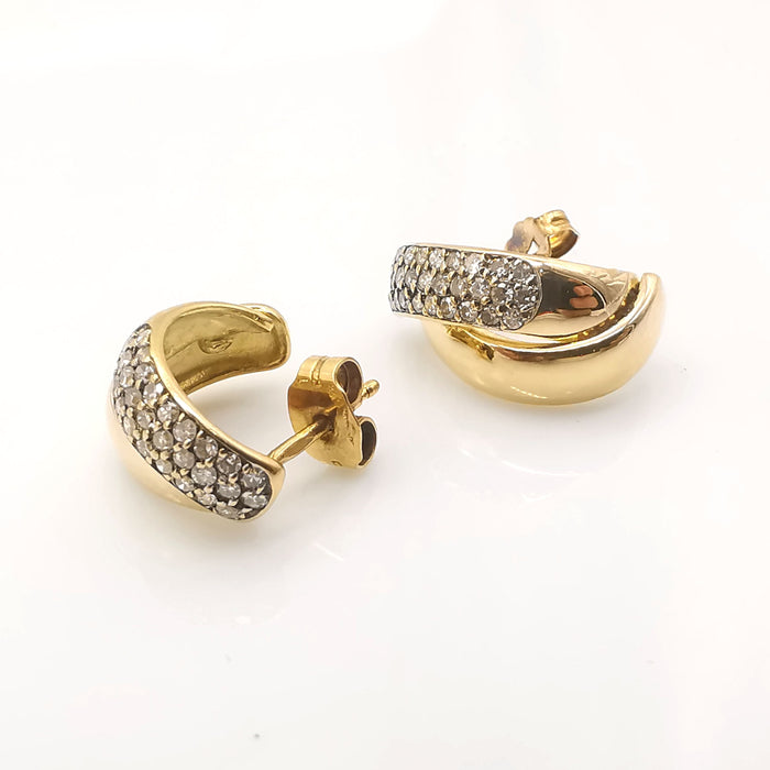 Ohrringe aus Gold und Diamanten
