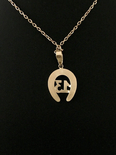 Pendentif Pendentif fer à cheval en or jaune 58 Facettes