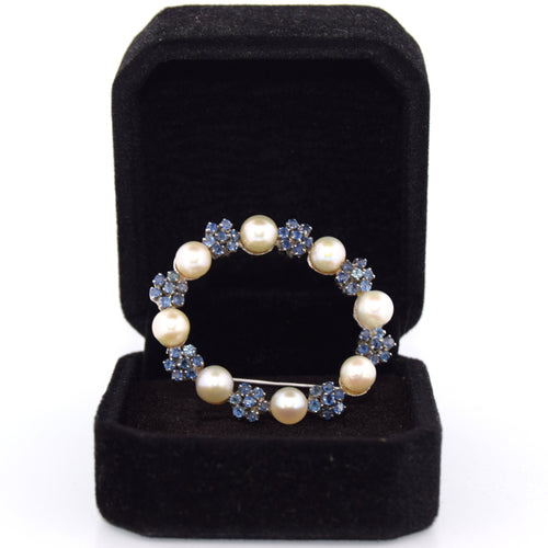 Broche Broche en or blanc, perles naturelles et saphirs 58 Facettes