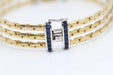 Bracelet Bracelet semi-rigide en or 18 carats avec diamants et saphirs 58 Facettes E361516