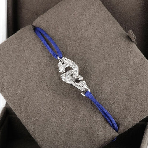 Bracelet Menottes R12 en or blanc et diamants 58 Facettes 341112