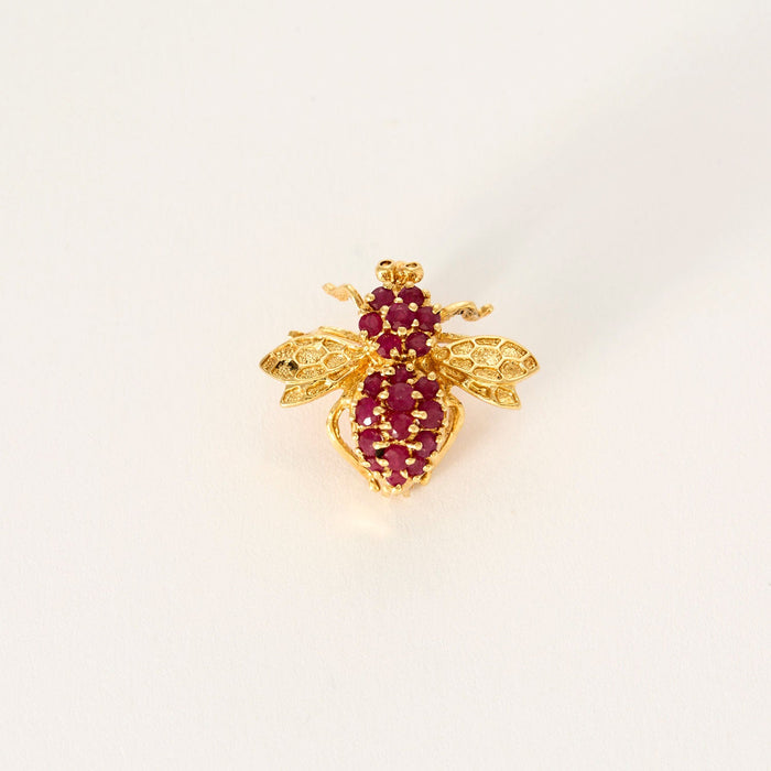 Yellow gold ruby bee brooch