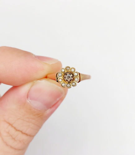 Bague 51.5 Bague marguerite or rose, diamant et perles (circa 1900) 58 Facettes A06283