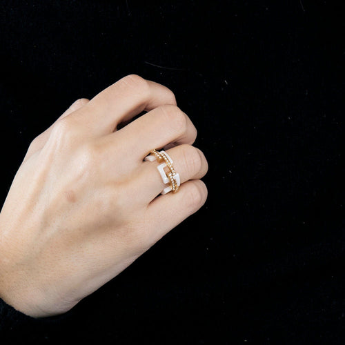 Bague 50 MELLERIO - Graphic - Bague or rose, céramique et diamants 58 Facettes J1PG463-9D50