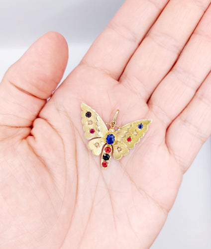 Pendentif Pendentif or rose papillon, pierres de couleur et perles 58 Facettes A05324