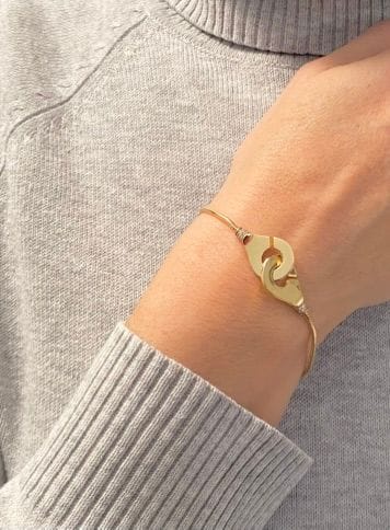 Bracelet DINH VAN - Bracelet Menottes en or jaune 58 Facettes