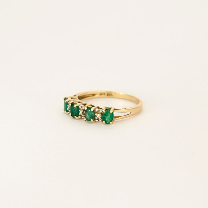 Yellow gold emerald river ring