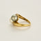 Bague 53 Bague or jaune, perles, sertie de diamants 58 Facettes 237