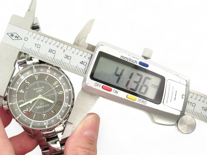 montre CHANEL j12 gmt h3099 en ceramique de titane 41mm chronomatic 58 Facettes 269992