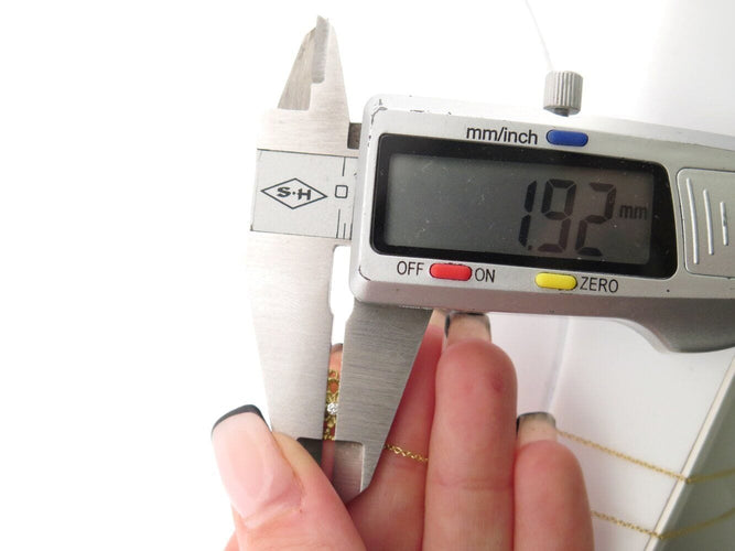 Collier collier ILIAS LALAOUNIS rosette 526005 diamants 0.02ct en or jaune 18k 58 Facettes 270148