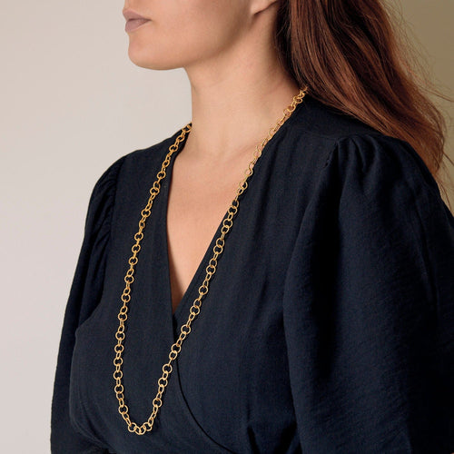 Collier Sautoir en or jaune à maillons ronds entrelacés 58 Facettes CLA0761