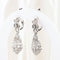 Boucles d'oreilles Boucles d'oreilles vintage ajourées en or blanc 18 carats serties de diamants 58 Facettes 135023B
