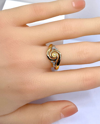 Bague 58 Bague en or jaune en perle et diamants sertis en or blanc 58 Facettes AB584