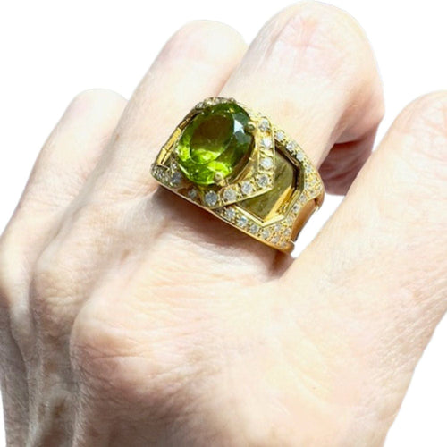 Bague bague en or avec diamants et péridot 58 Facettes Q116B(948)