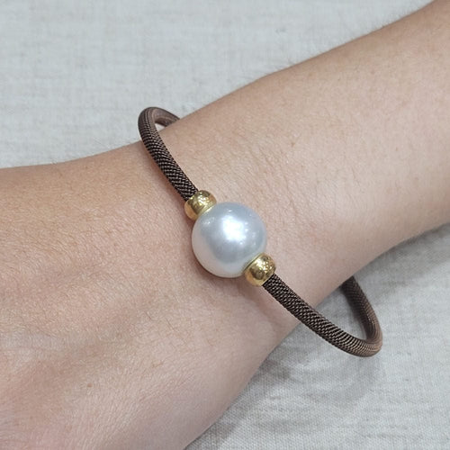 Bracelet Bracelet en acier marron avec perle d'Australie 58 Facettes PUV209