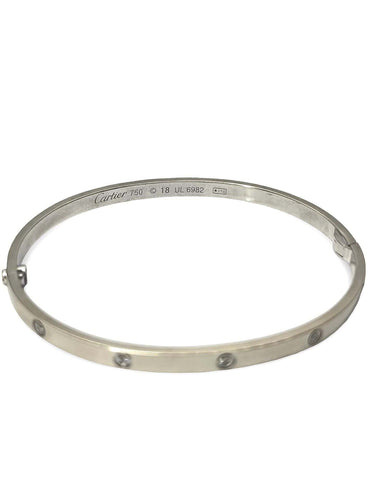 Bracelet Bracelet petit modèle Love Cartier or blanc et 10 diamants 58 Facettes 00056302