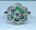 Bague 54 Bague or blanc, émeraudes, diamants 58 Facettes AB379