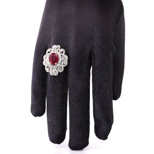 Bague 54 Bague en or blanc avec rubis, diamants et baguettes 58 Facettes