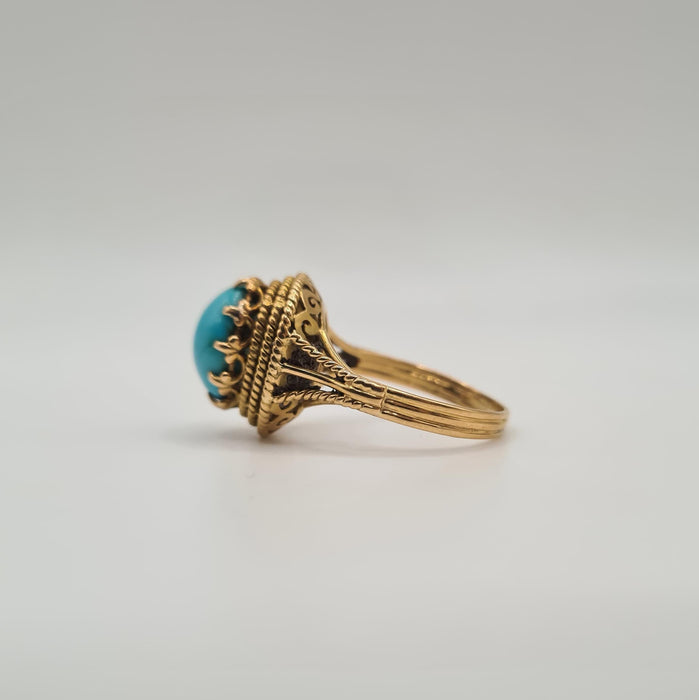 Bague 60 Bague or jaune sertie d’une turquoise 58 Facettes