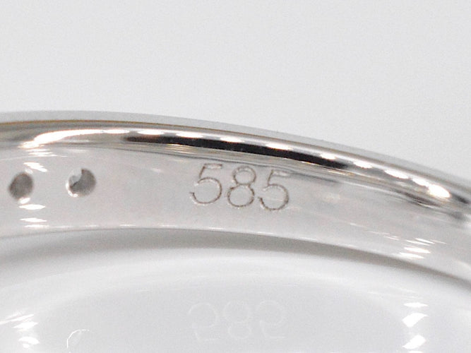 Bague 54 Bague entourage en or blanc avec diamants 58 Facettes 2006