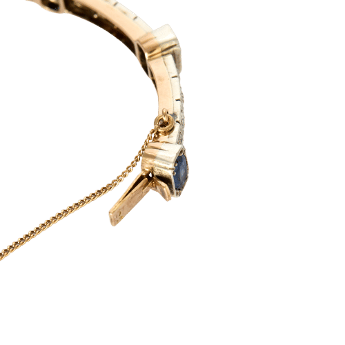 Bracelet Bracelet jonc ouvrant en or jaune et argent, diamants et saphirs 58 Facettes 230460