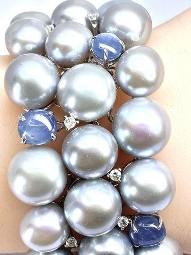 Bracelet Important bracelet or blanc, saphirs étoilés, diamants et perles grises 58 Facettes AB632
